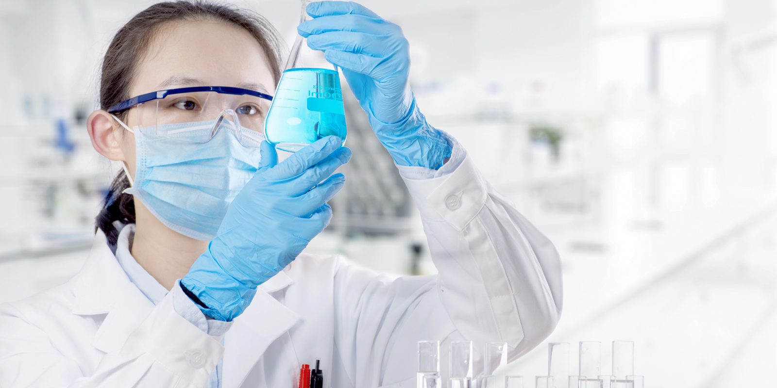 Lab technician examining a sample